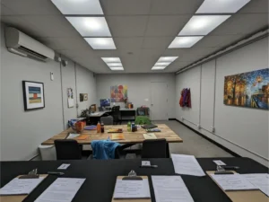 Photo of a PNNL light perception testing laboratory illuminated by Telelumen Dittosizer programmable LED luminaires. The photo shows the light quality to be programmed to “cool” appearance, blue spectrum enhanced, CCT values greater than 5000K.